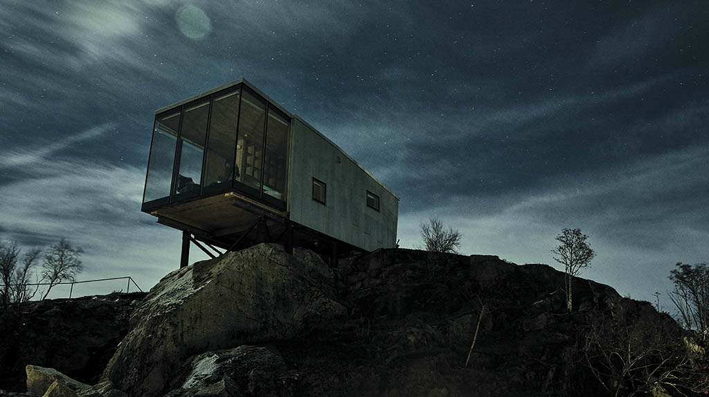 Cubo mágico do Manshausen com a aurora boreal