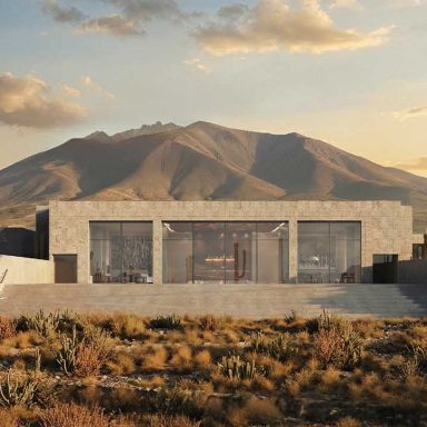 Casa Gastón no Salar de Uyuni, na Bolívia, com arquitetura integrada à paisagem andina, vista para o altiplano, o Vulcão Tunupa e o deserto de sal